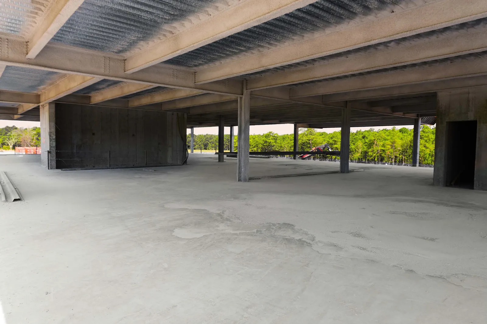 Finished concrete slab on an elevated commercial deck