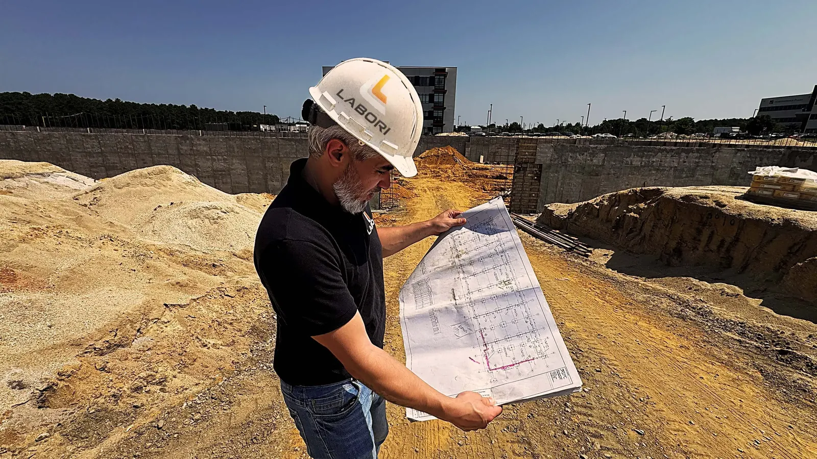 LABORI on site reviewing structural foundation plans