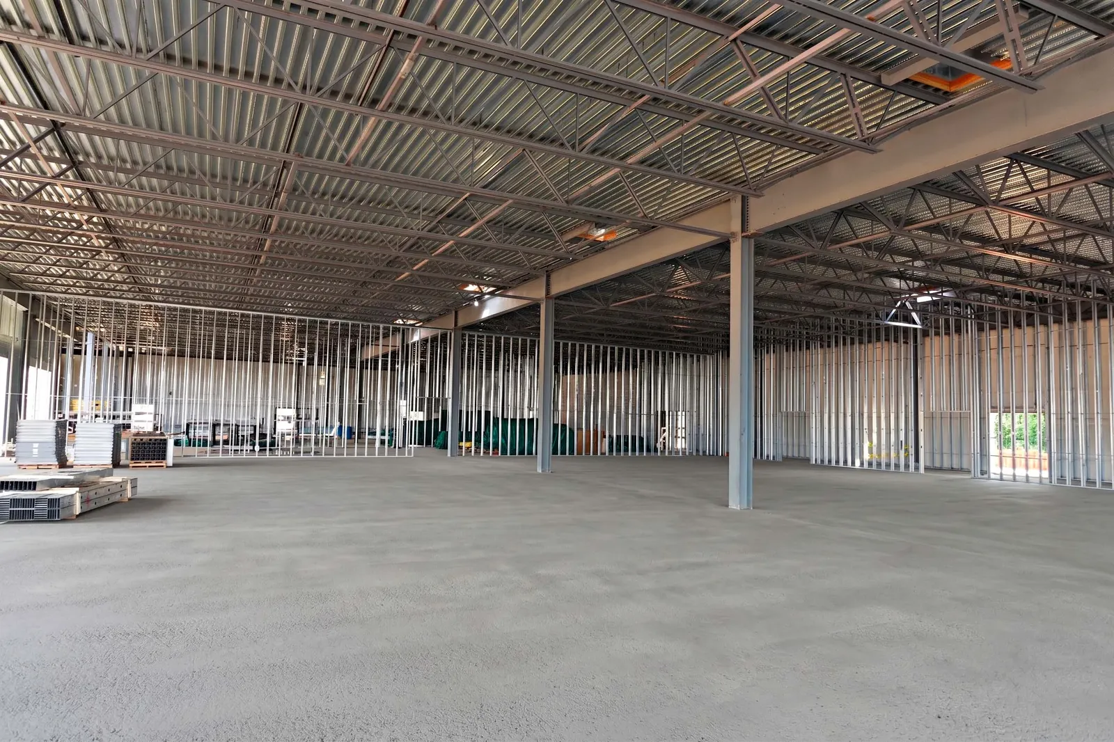 Freshly placed concrete floor in a commercial warehouse